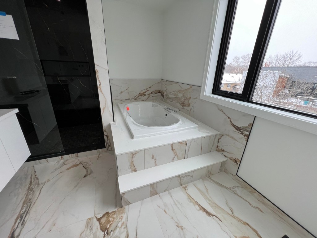 Jacuzzi Tub Tile Renovation with White Tile