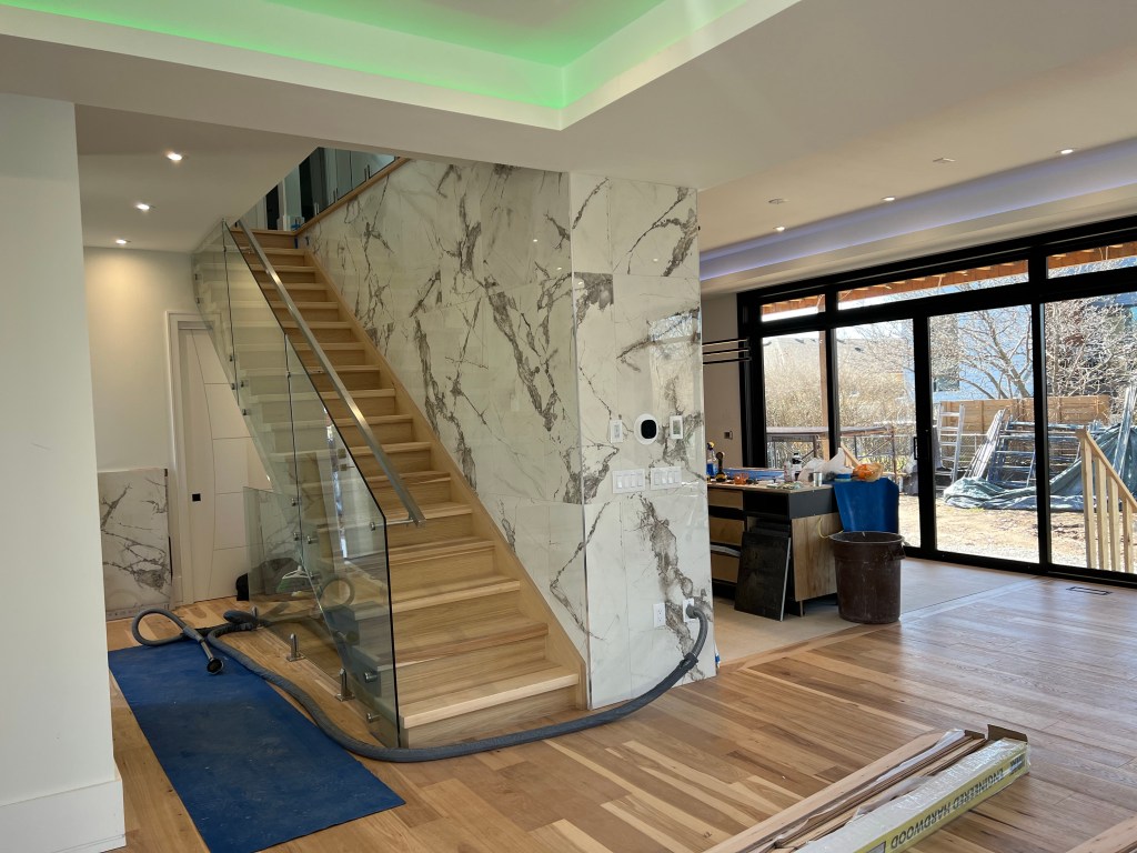 White Tile Around Staircase